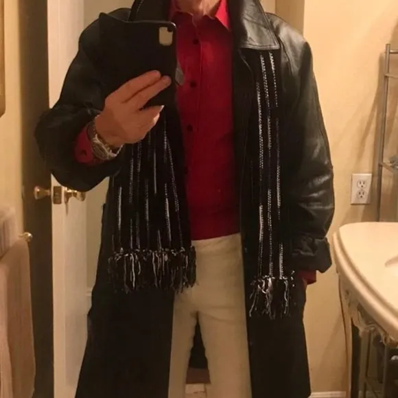 Black leather jacket by a USA designer, and with black sheepskin insulation .