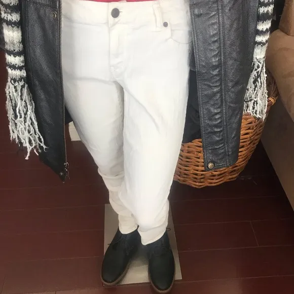 Black leather jacket by a USA designer, and with black sheepskin insulation .