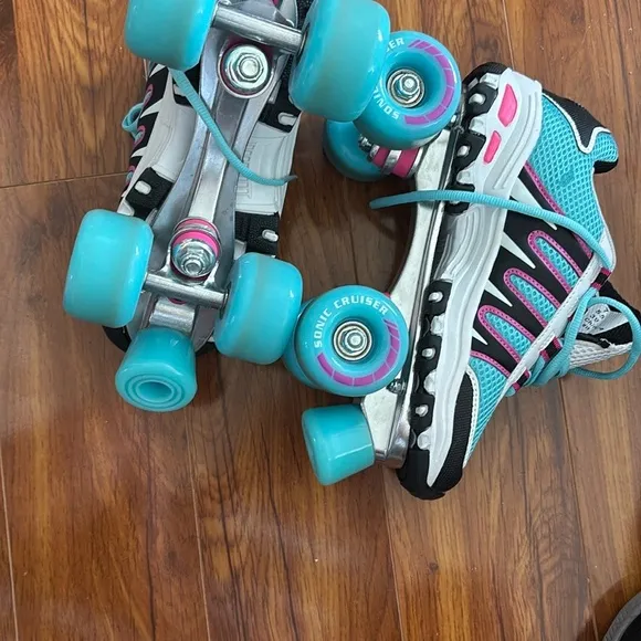 Blue and Black Roller Skates with elbow and knee pads included!
