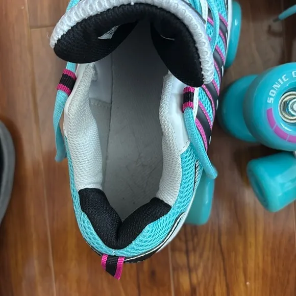 Blue and Black Roller Skates with elbow and knee pads included!