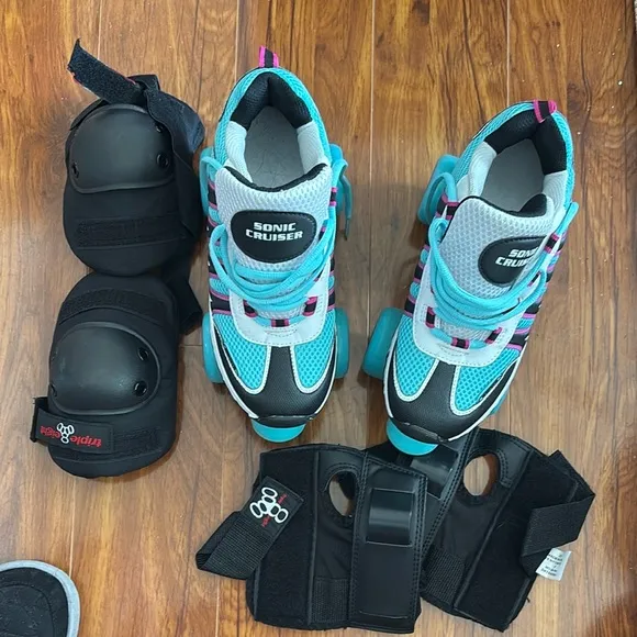 Blue and Black Roller Skates with elbow and knee pads included!