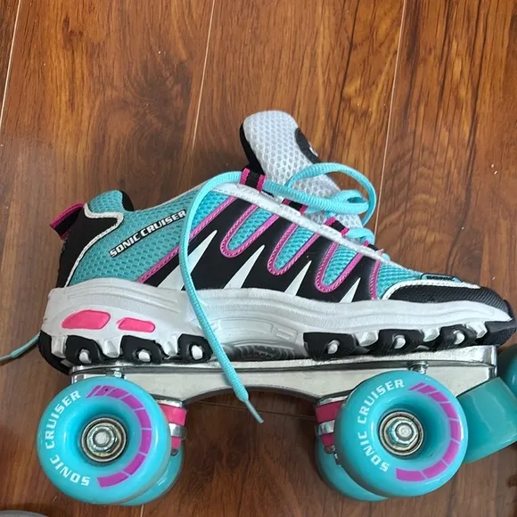 Blue and Black Roller Skates with elbow and knee pads included!