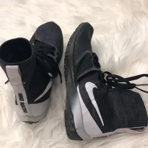Boys Nike racing shoes