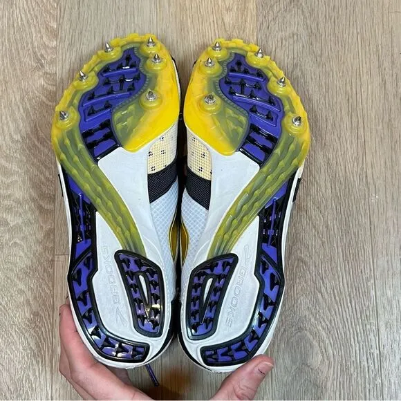 Brooks ELMN8 Track and Field Running Shoes with Spikes in Gold/Purple size 10