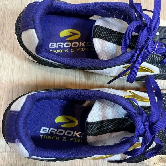Brooks ELMN8 Track and Field Running Shoes with Spikes in Gold/Purple size 10