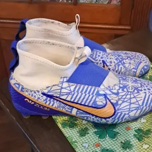 Nike Kids Blue and Orange Soccer Shoes