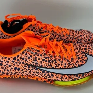 Nike Orange and Black Sneakers with Bold Design