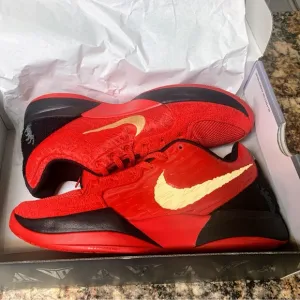 Nike Red and Gold Athletic Shoes