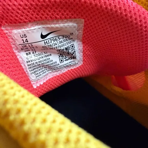 Nike Yellow and Blue Athletic Shoes with Sleek Design