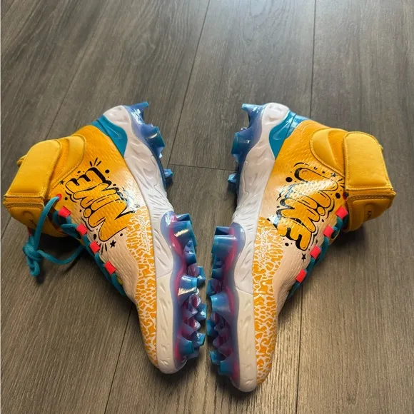 Nike Yellow and Blue Athletic Shoes with Sleek Design