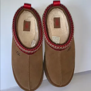 UGG Tasman Slippers – Chestnut Suede with Red Braid Trim, Size 8